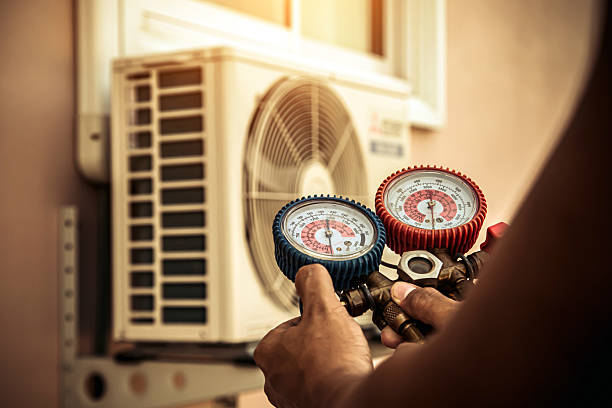 Professional Air Conditioning Service technician working in Cedar City, UT